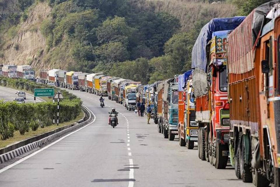 Trucks remain stranded as Jammu-Srinagar national highway on Monday, November 11, 2019.